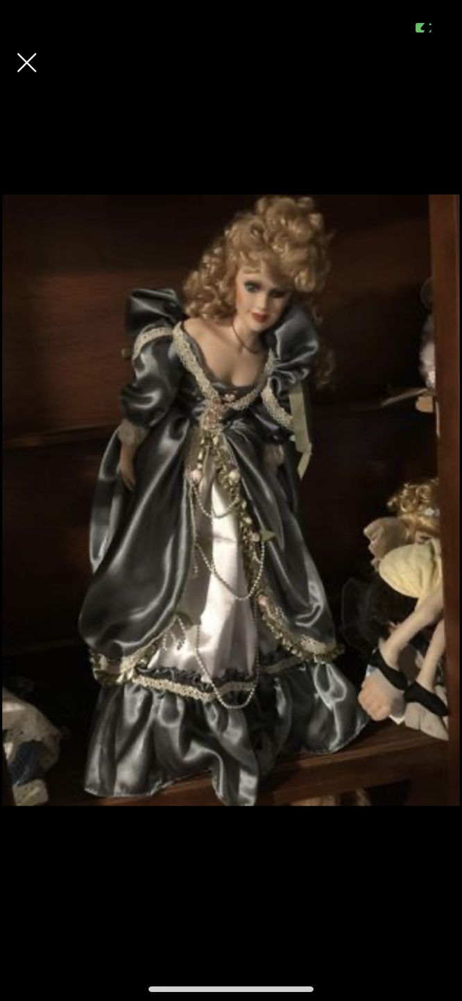 Tall porcelain doll