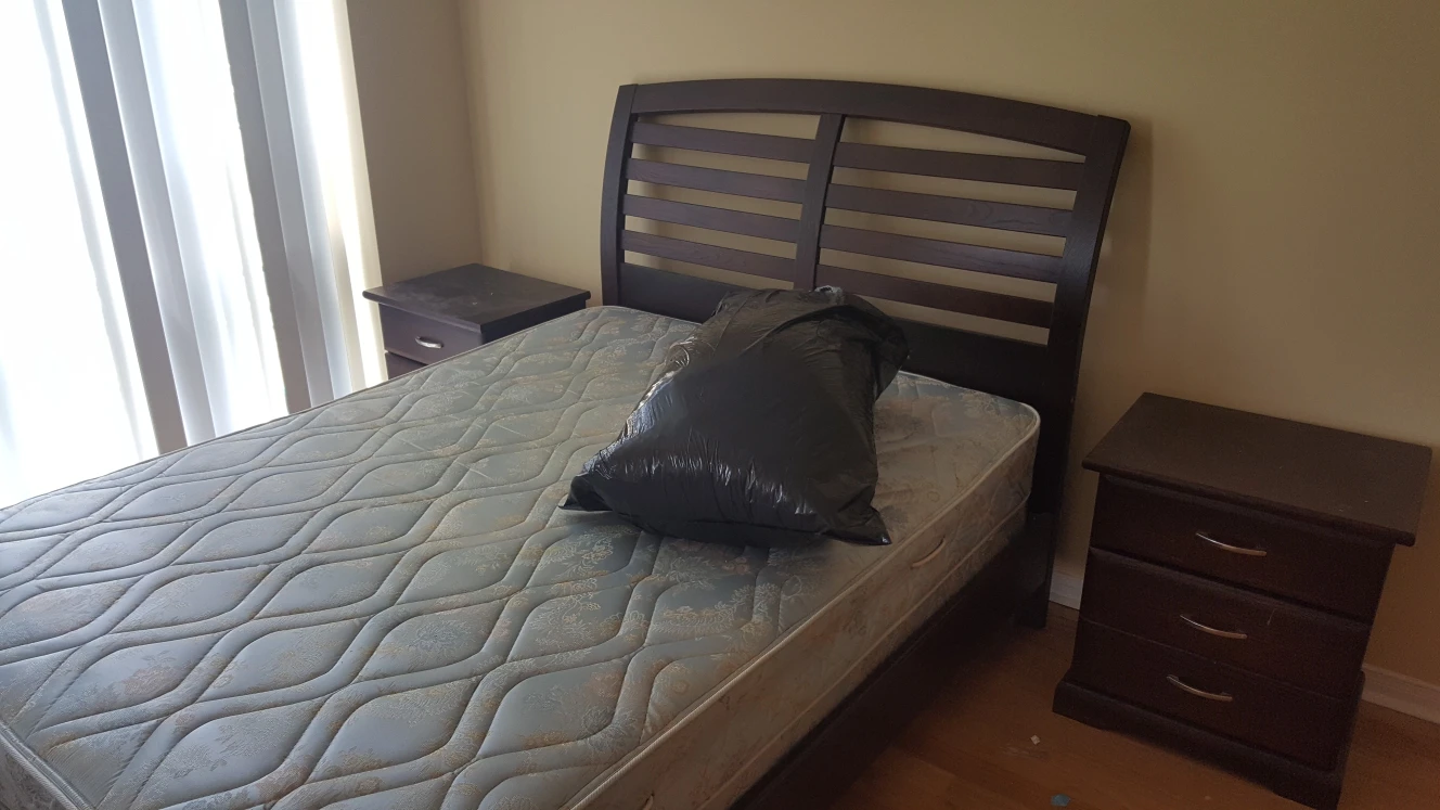 double bed (can extend to a queen) and two matching nightstands
