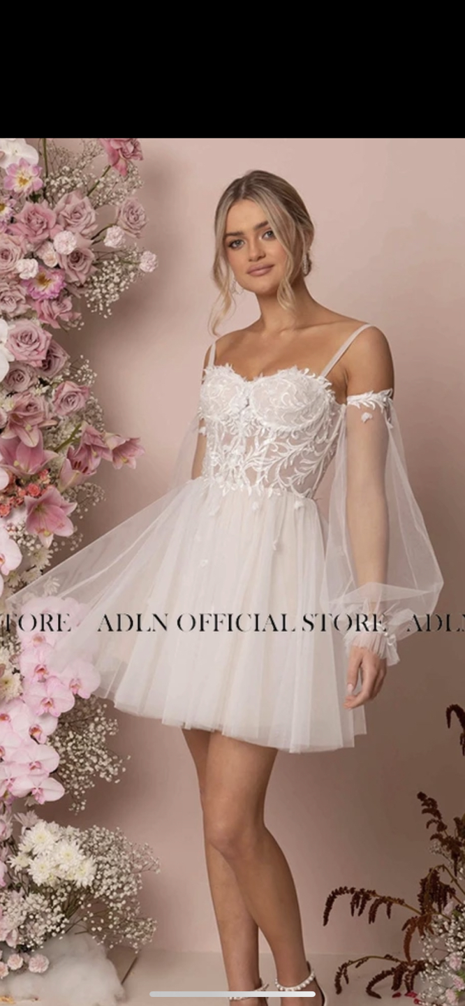 White party dress with detachable sleeves image indicator(4)