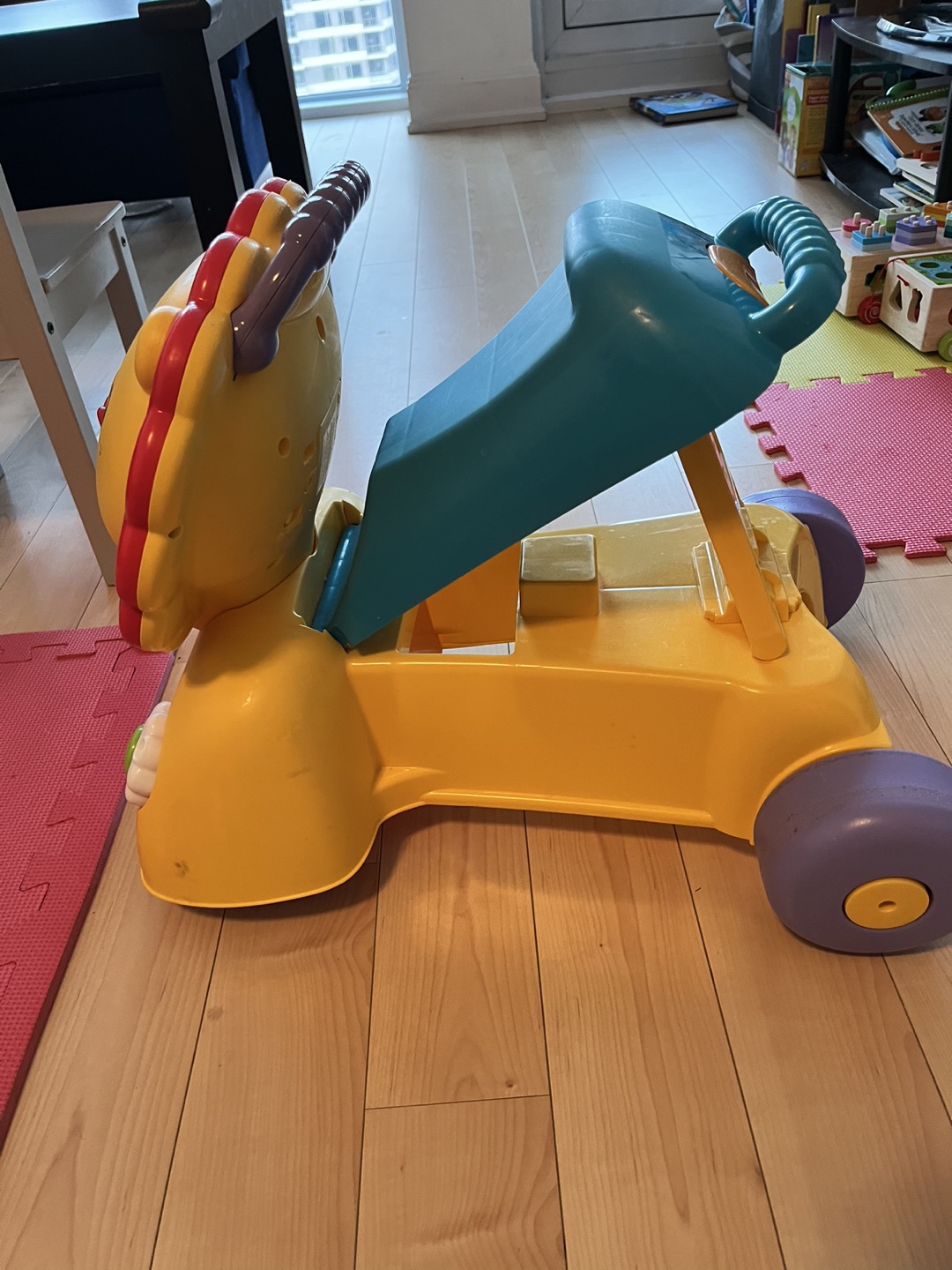 Stand and push/ sit and glide lion toy