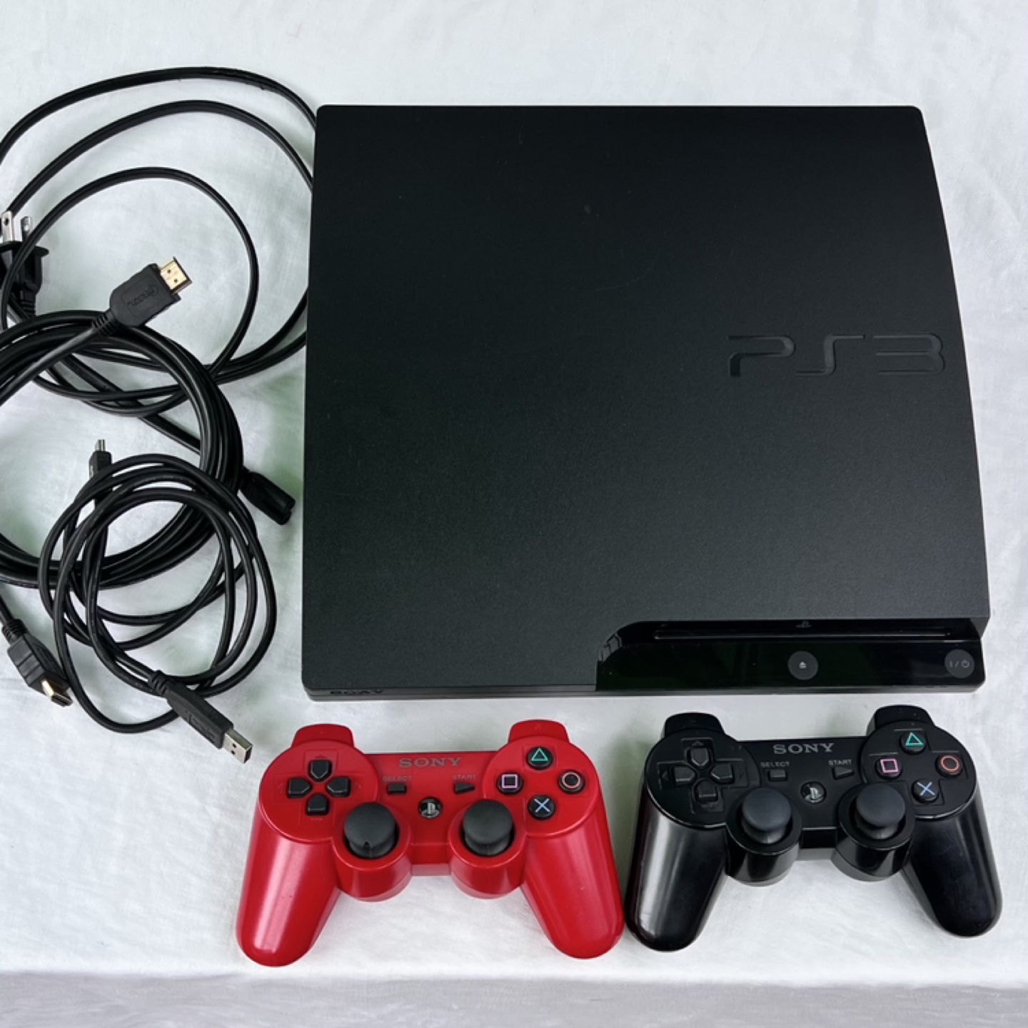 PS3 Slim Console with 2 controllers- 320gb thumbnail
