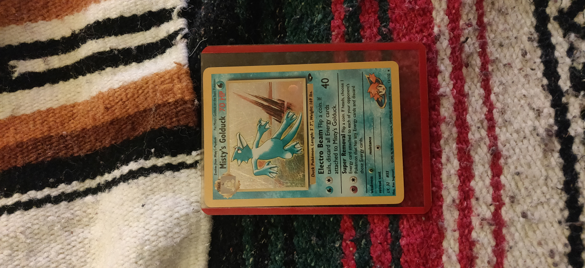 Misty's Golduck Holographic Pokemon Card thumbnail