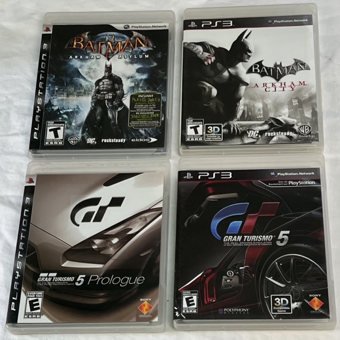 4 Games PS3— Batman Arkam City/Asylum, Gran Turismo 5/Prologue thumbnail
