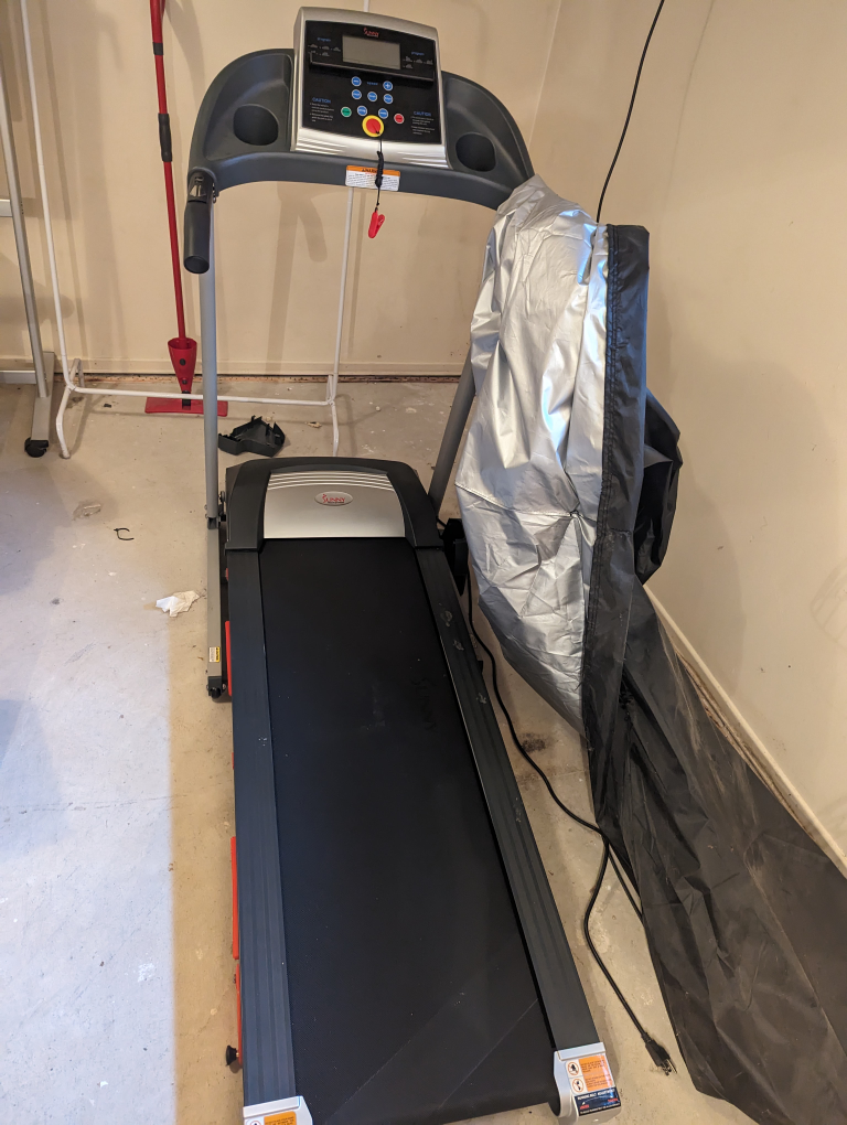 Treadmill with cover