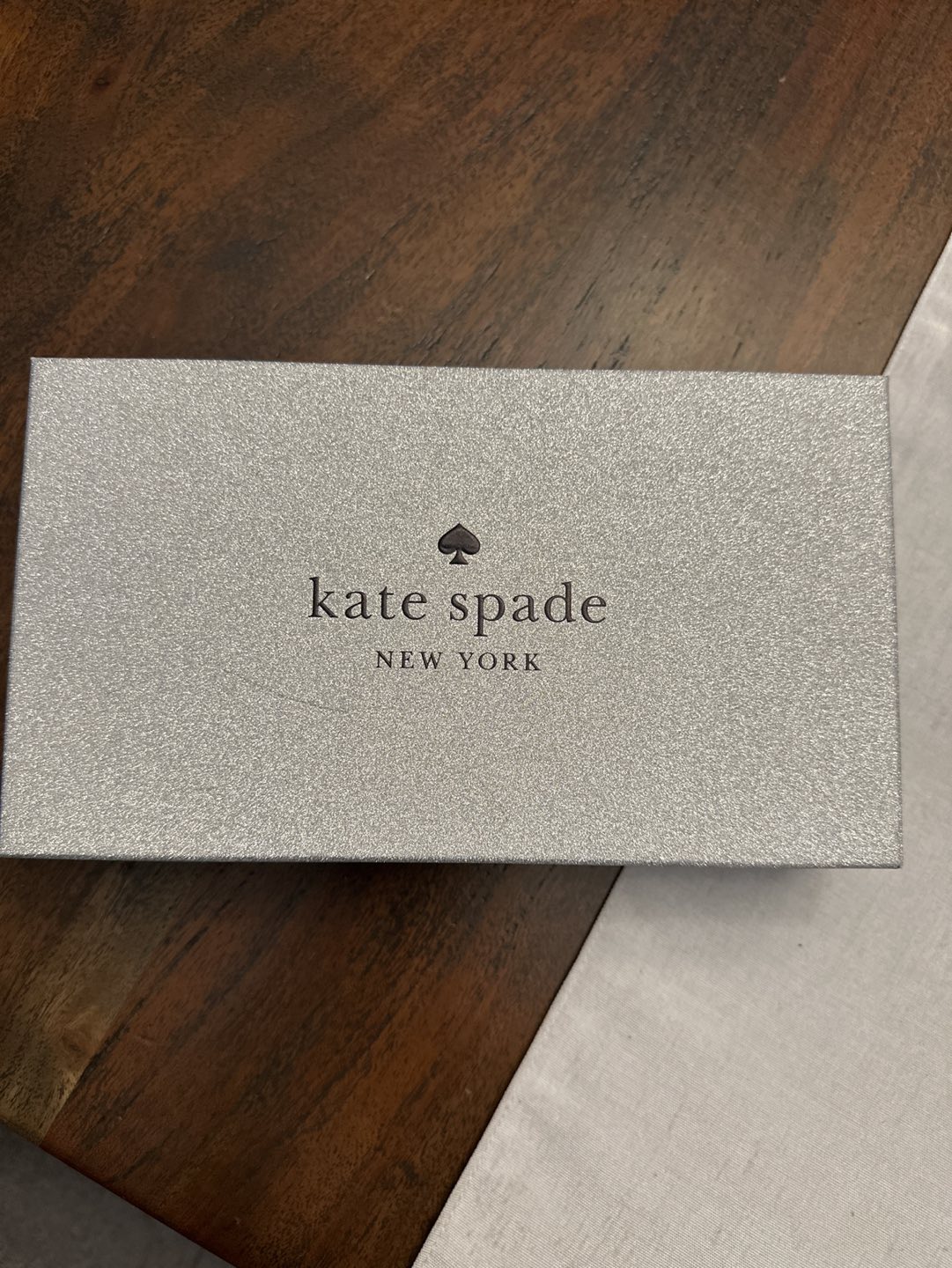 Black glitter medium Kate Spade wallet with strap thumbnail