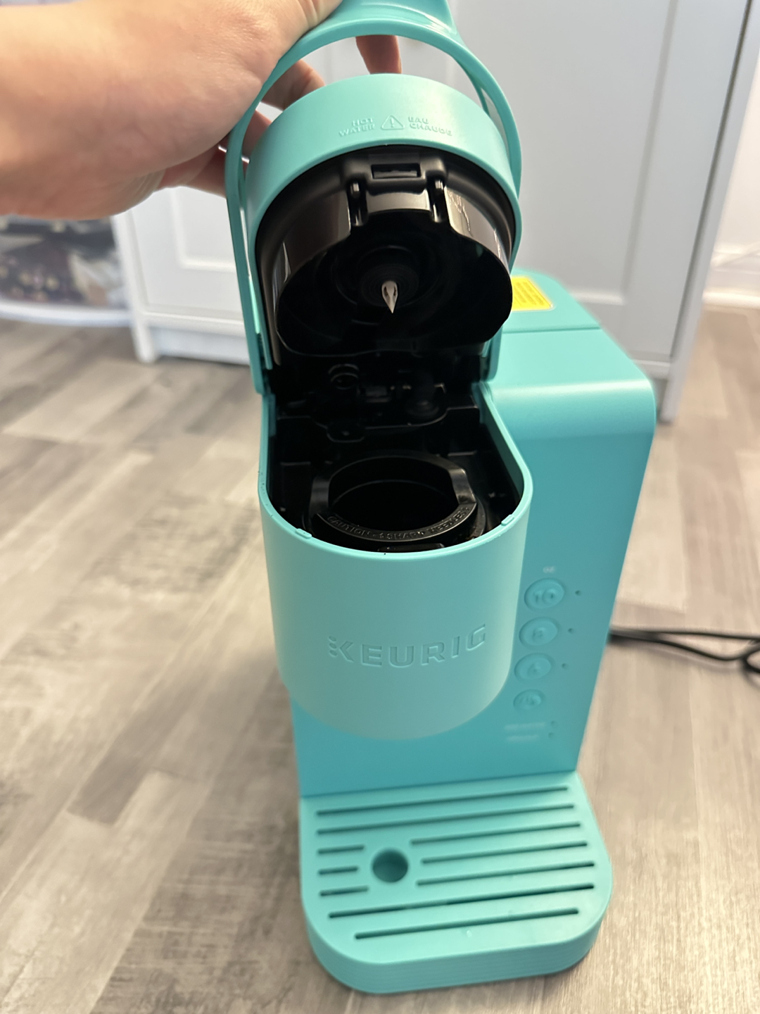 K-cup coffee machine and pods holder