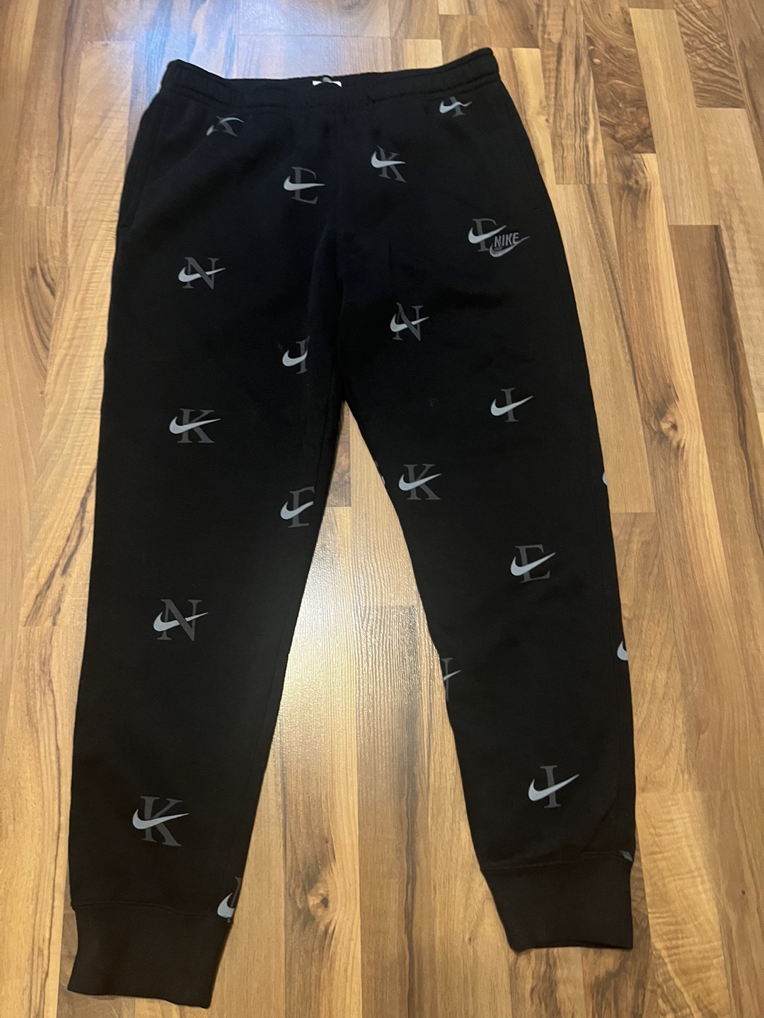 Nike All-Over Logo Pants Size M