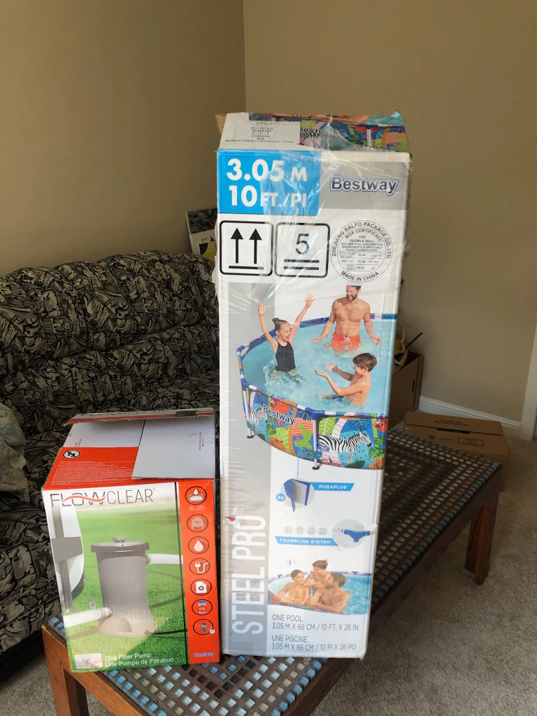 Like new 10 ft steel frame pool with pump and cover 