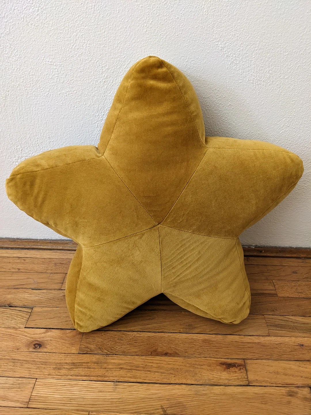 Star-shaped throw pillow.