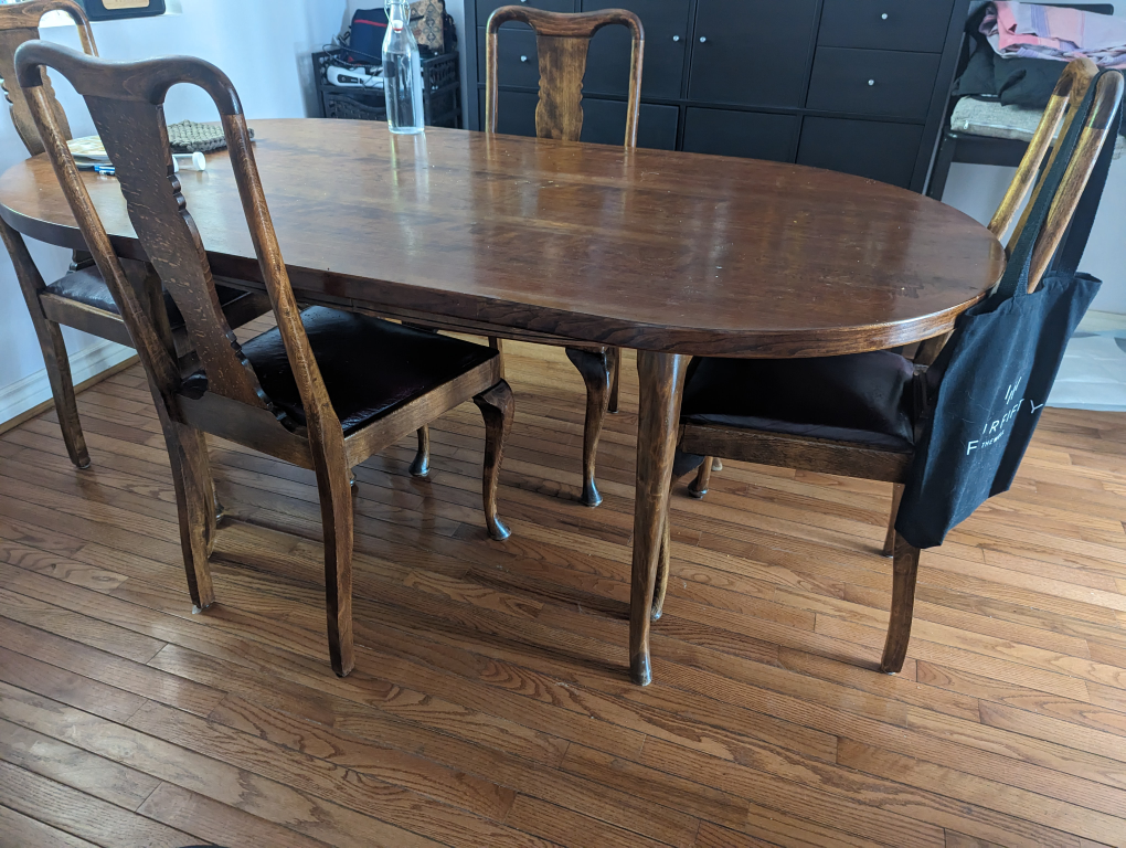 Oval dining table with 4 chairs