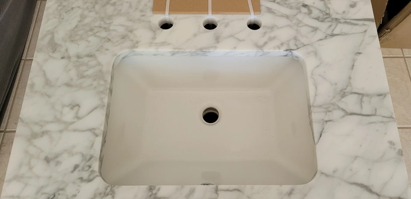 30 inch new vanity with Carrara marble top. - photo 3