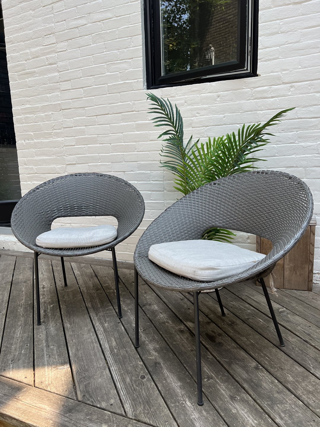 Two Outdoor Wicker Chairs
