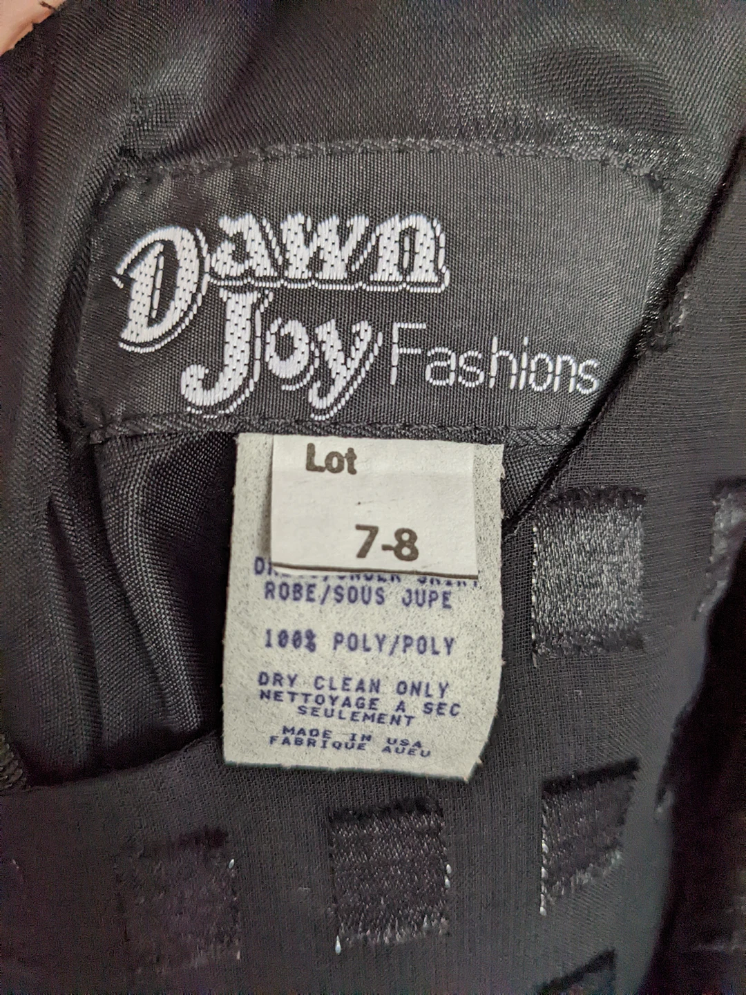 Dawn Joy Black Layered dress with a square pattern and ribbon image indicator(3)