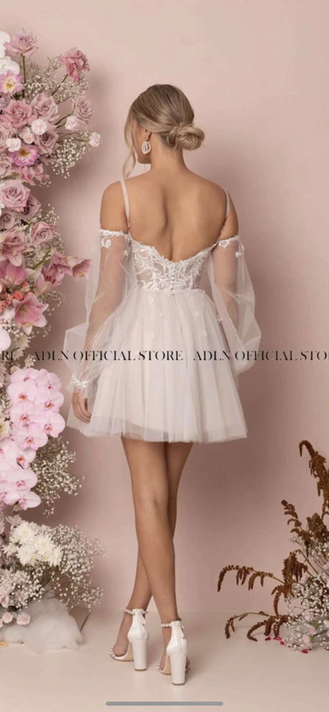 White party dress with detachable sleeves image indicator(2)