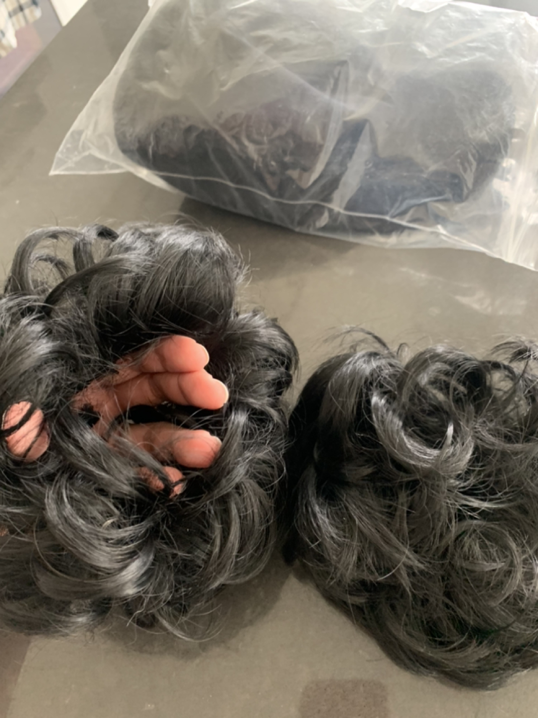 Two hair scrunchies and baseball cap with extensions sewn in image indicator(2)