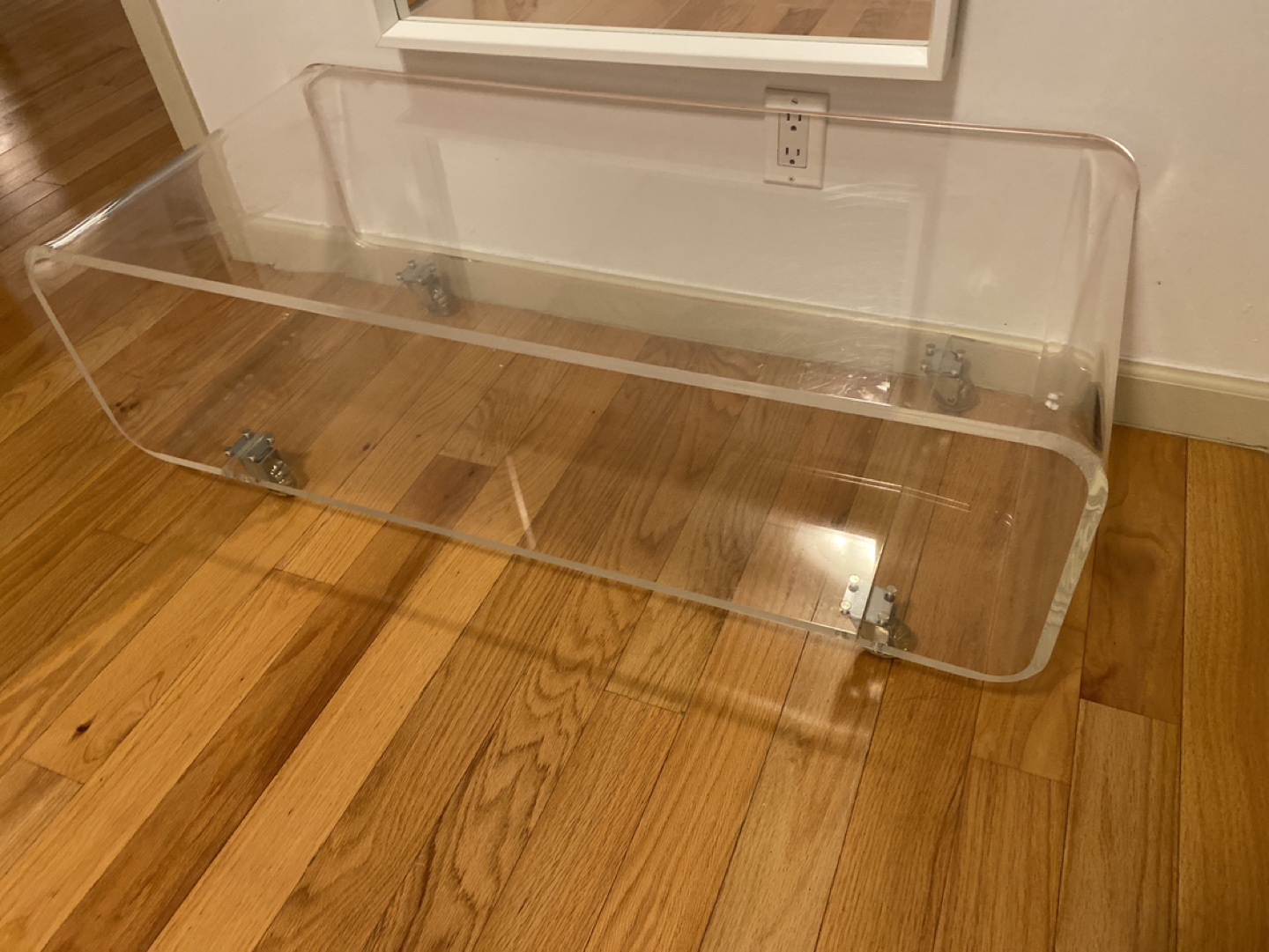 Acrylic coffee table on wheels