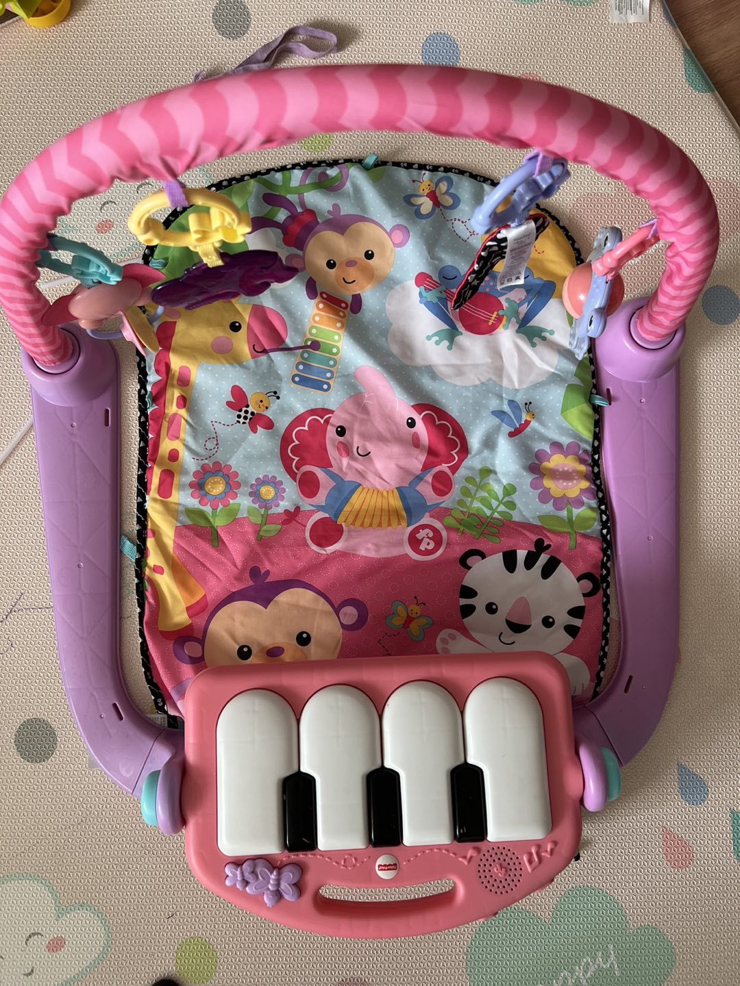 Baby play gym with a piano thumbnail