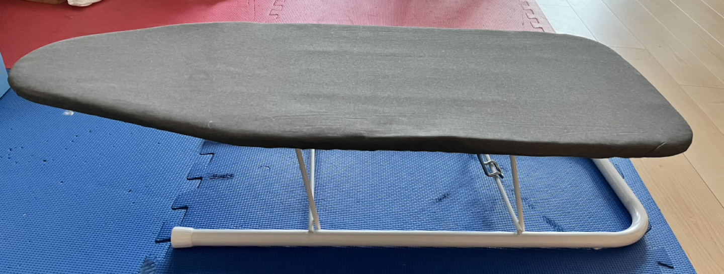 Foldable table top ironing board