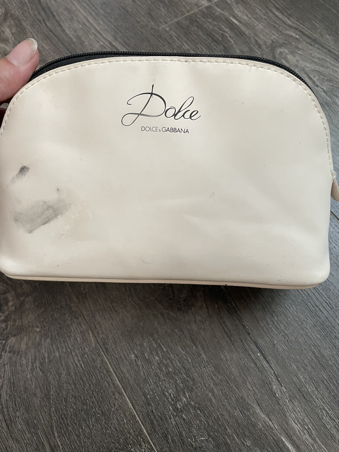 nail polish in dolce and gabbana bag thumbnail