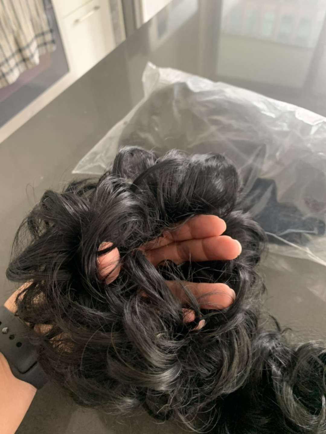 Two hair scrunchies and baseball cap with extensions sewn in thumbnail