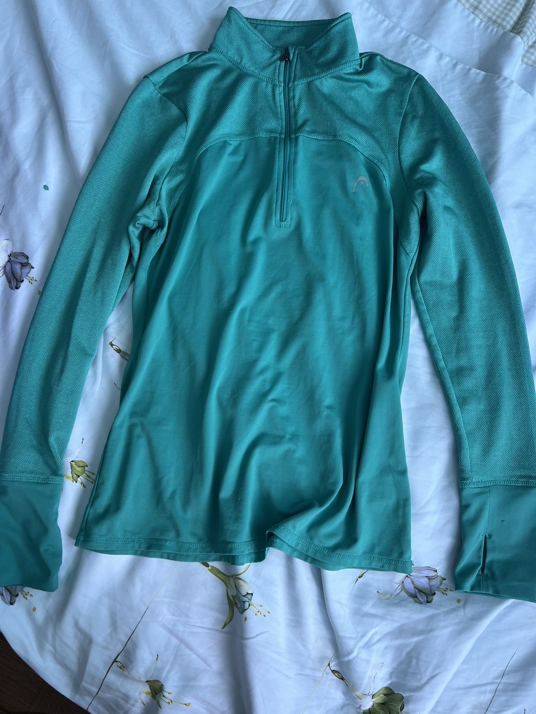 Blue green sports sweater w/ thumb holes on sleeves