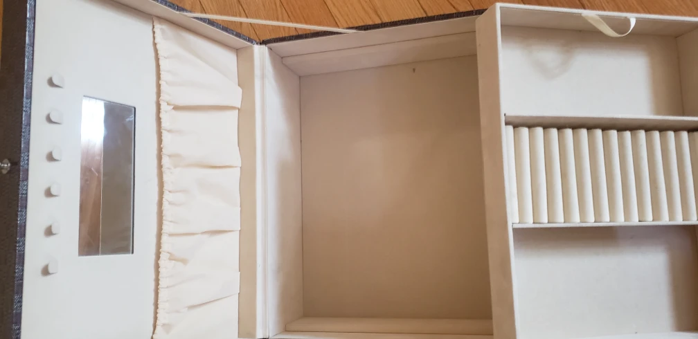 Jewelery box. mirror.  rings. under storage. image indicator(3)