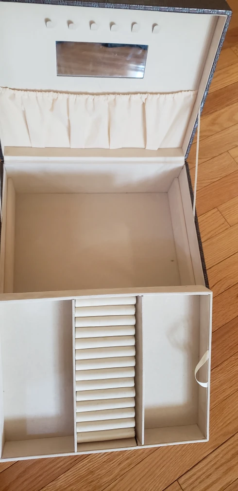 Jewelery box. mirror.  rings. under storage. image indicator(4)