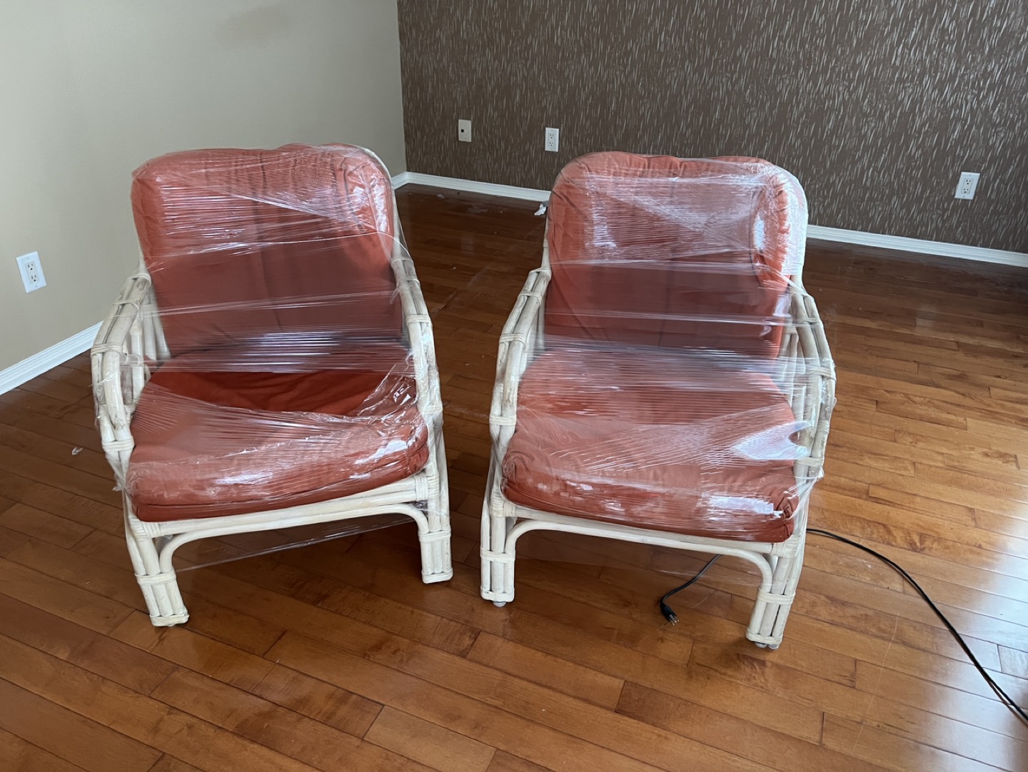2 ratan arm chairs thumbnail