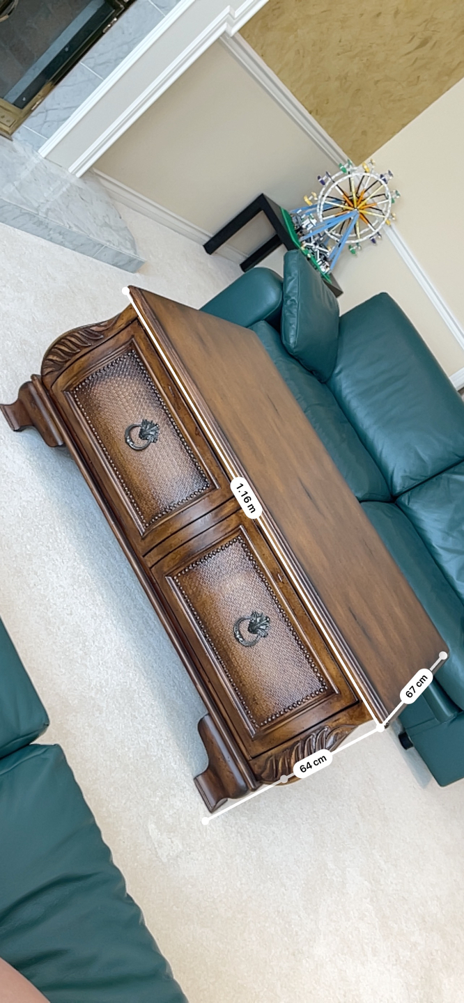 Decent wooden coffee table with drawers