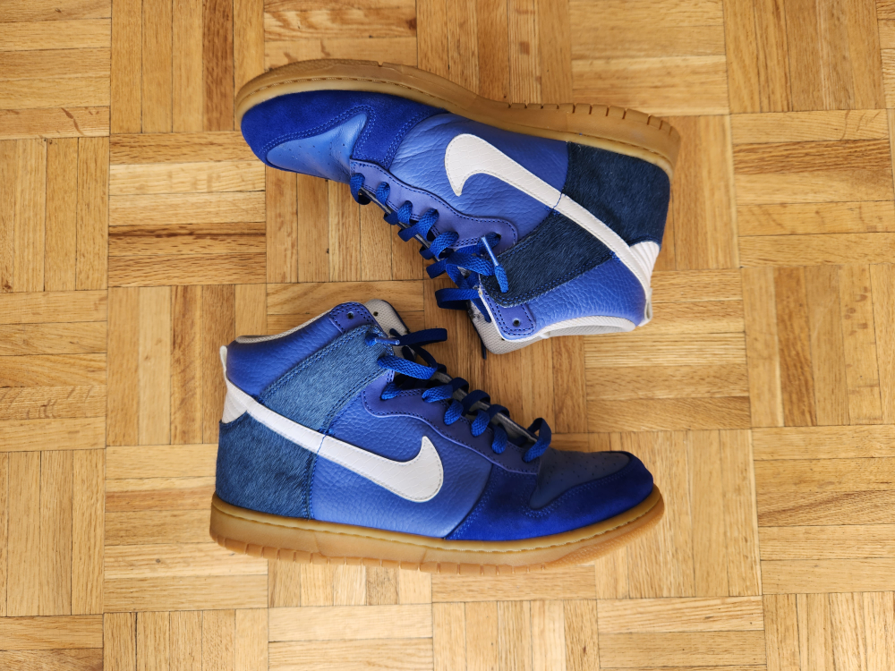 Nike zoom dunk high premium blue, white, and gum.