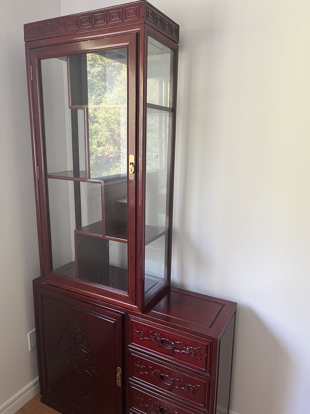 Red wood cabinet with glass display hutch