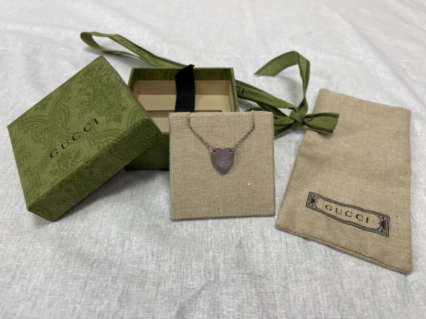 GUCCI Trademark bracelet with heart pendant