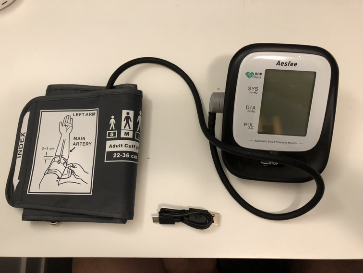 Arm blood pressure monitor