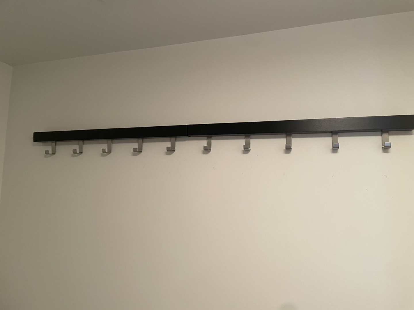 Wall clothes hanger