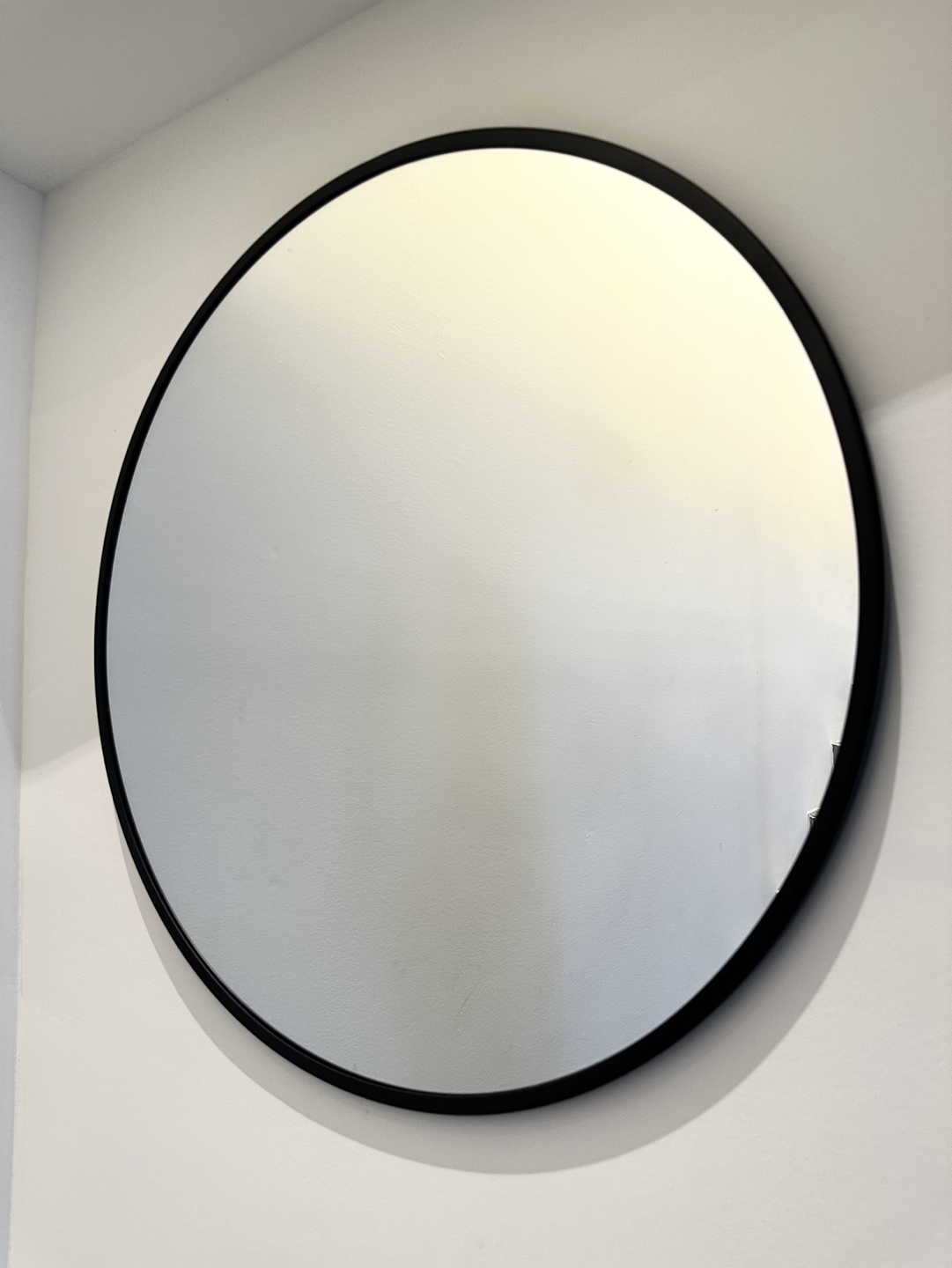 Black round mirror