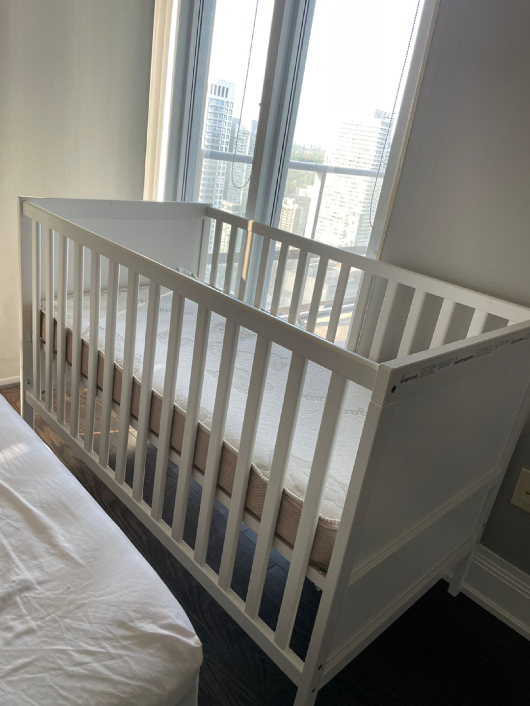Baby crib with mattress