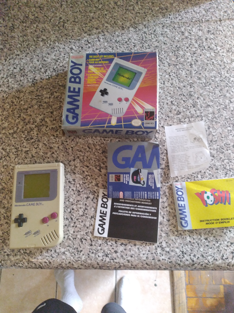 original Nintendo gameboy with books and box  thumbnail