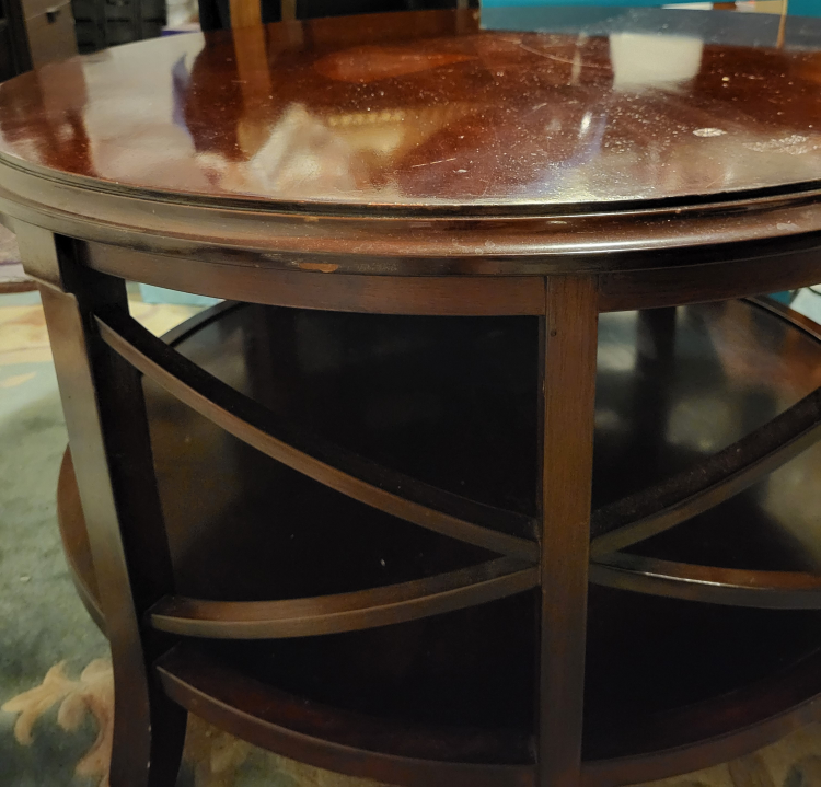 Round coffee table with lower thumbnail