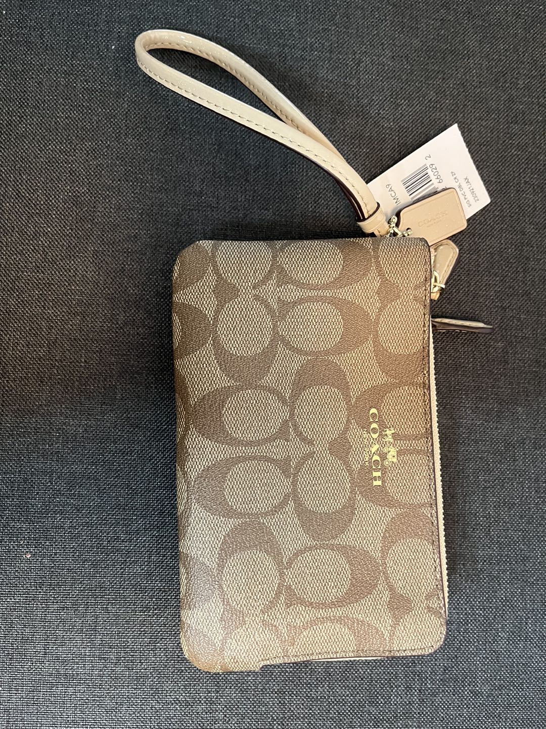 Coach wristlet - NWT image indicator(4)