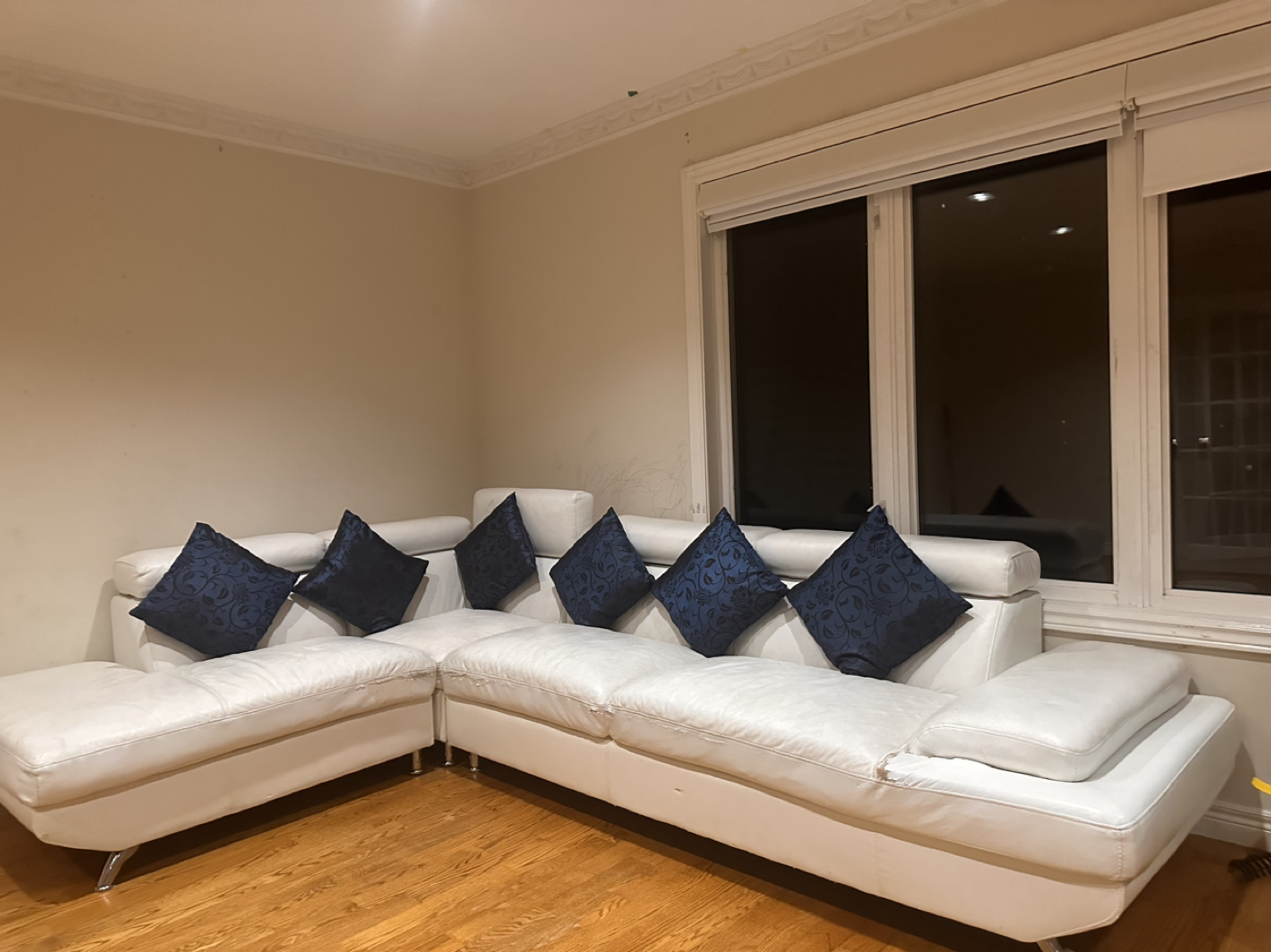 White sectional with cushions