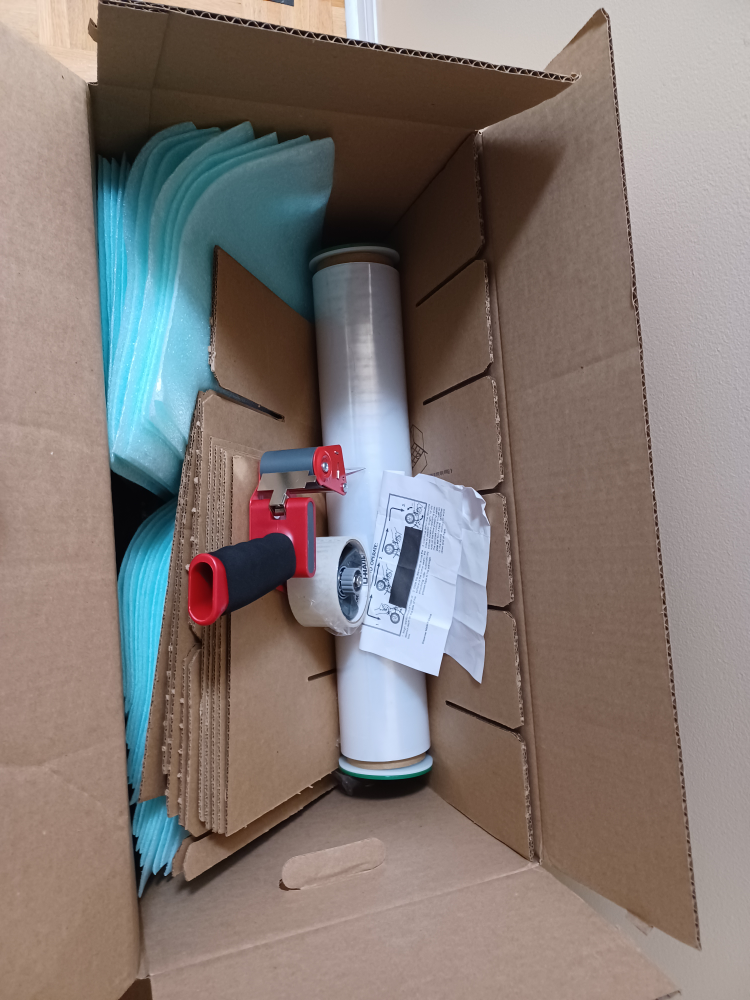 Moving Boxes wrap and tape gun thumbnail