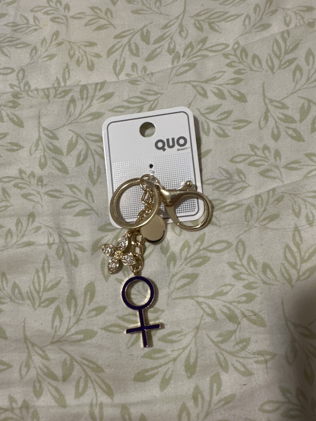 Keychain with Flower Charm & Female Symbol