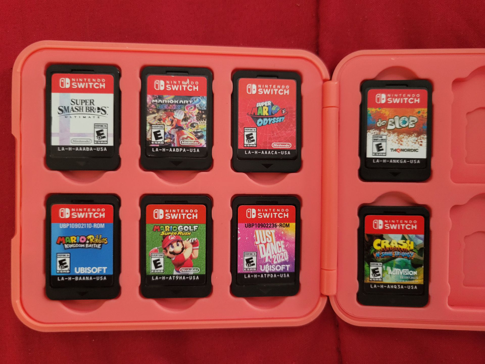 Nintendo switch lite with case + games - photo 2