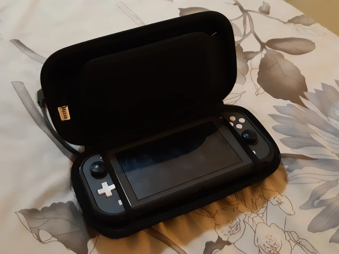 Nintendo switch lite Bundle - 200Gb - photo 2