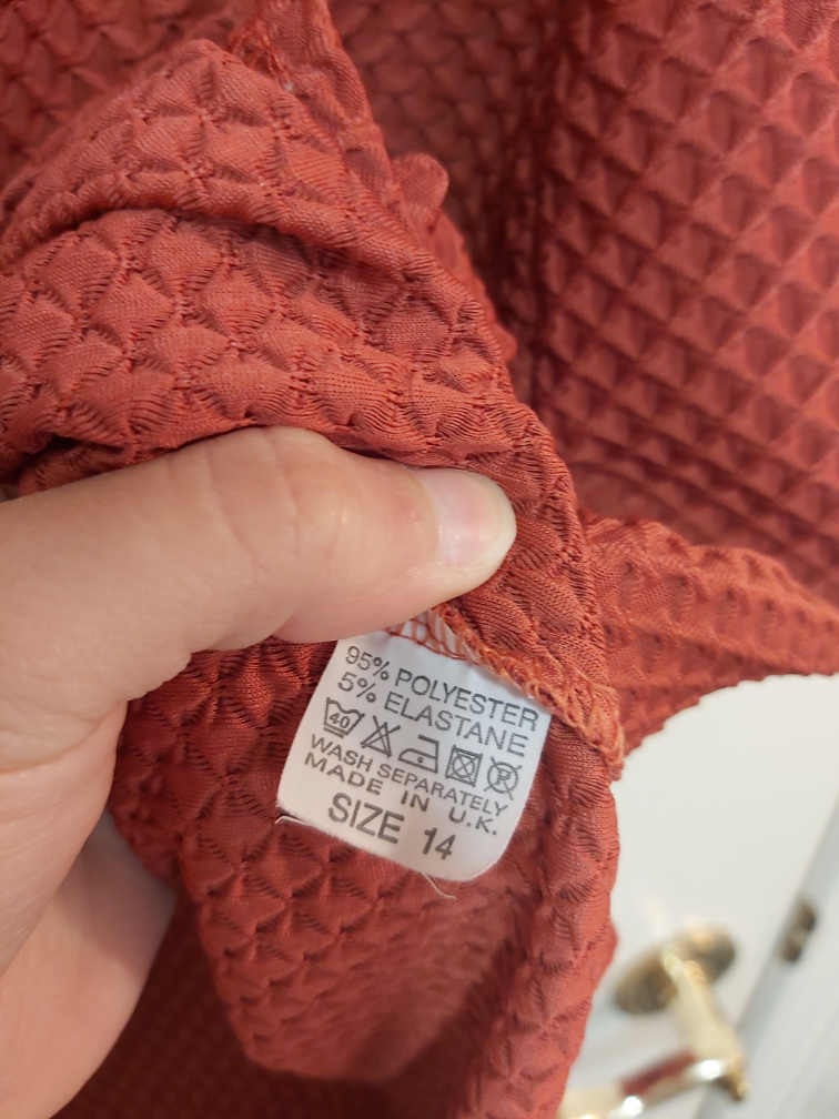 MISSGUIDED burnt orange textured skirt, size M/L image indicator(7)