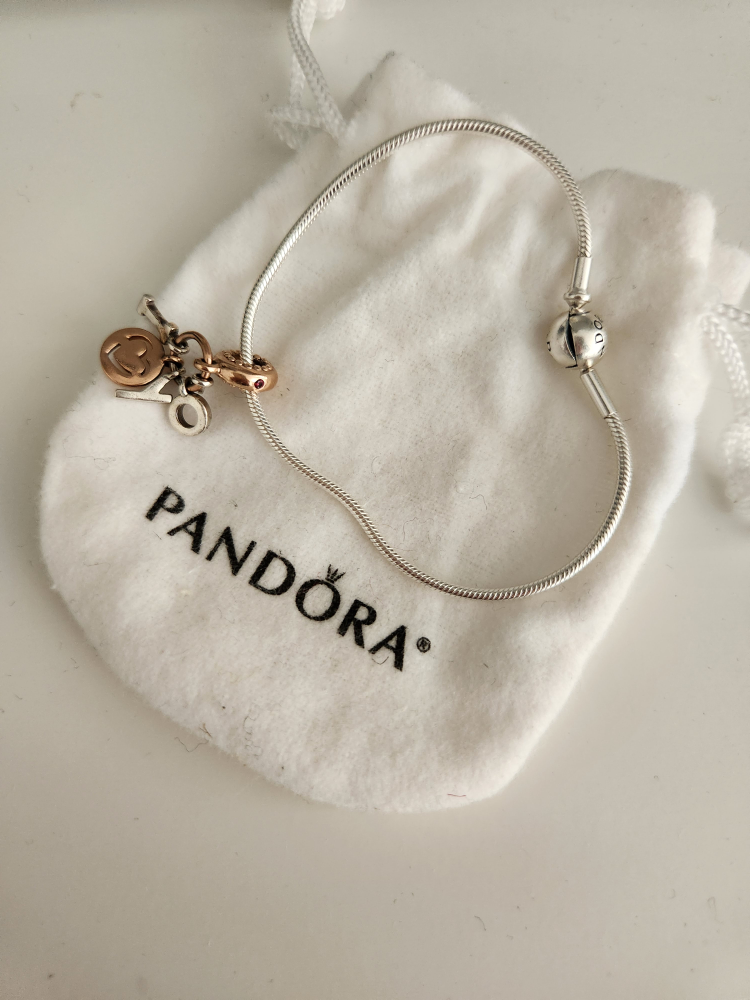 Pandora barcelet W/ a charm