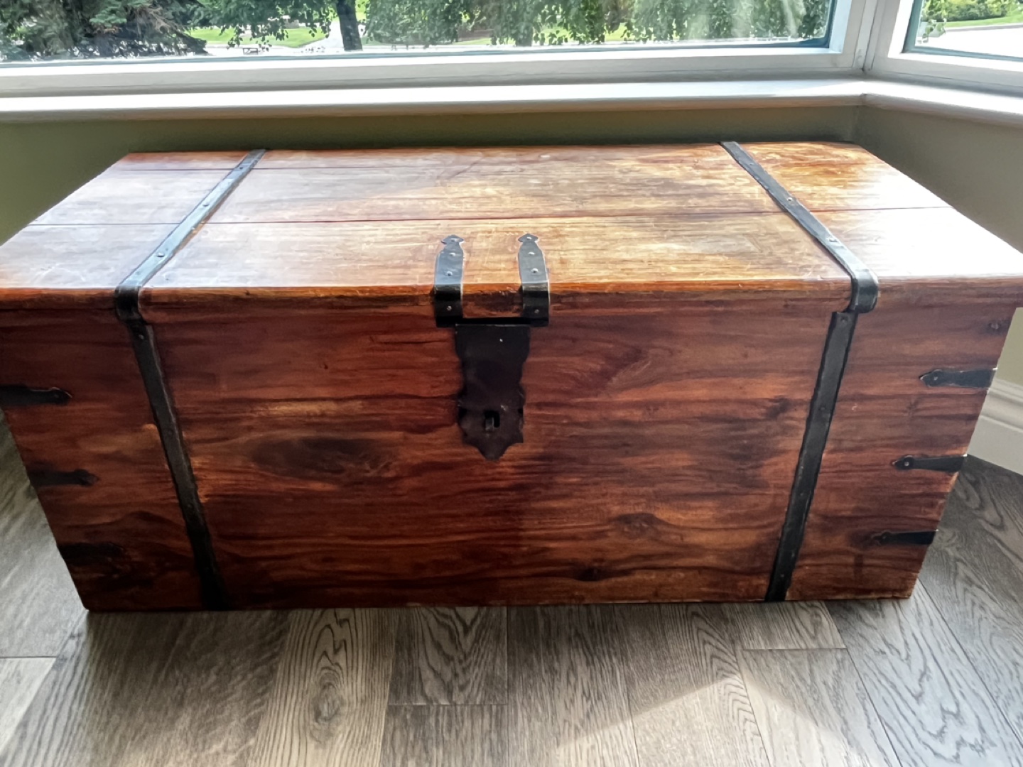 Wooden chest with metal hardware