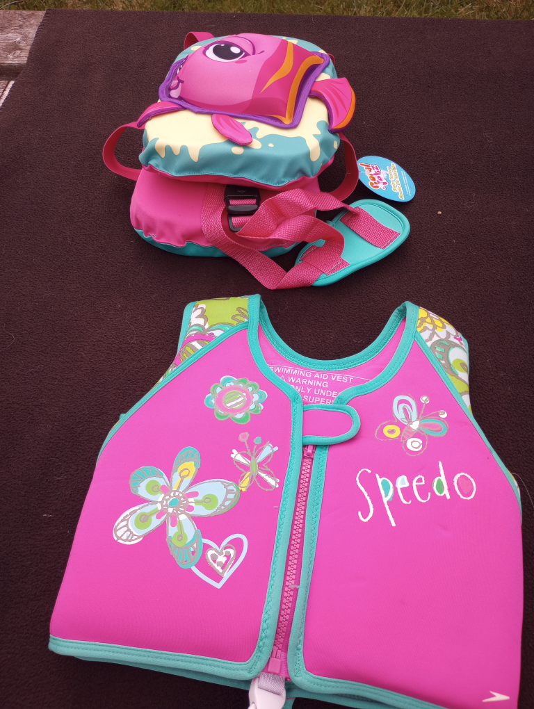child swimming flotation vests.  $10 each image indicator(5)