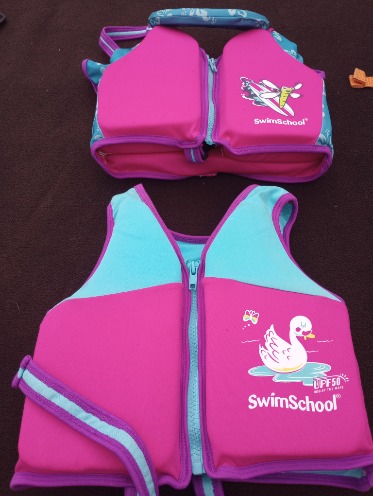child swimming flotation vests.  $10 each image indicator(6)