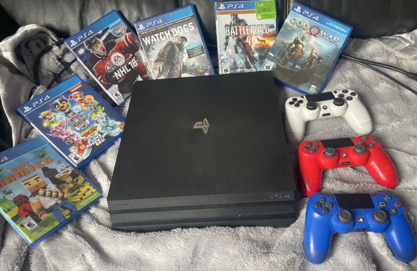 PS4Pro System, 6 games and 3 controllers thumbnail